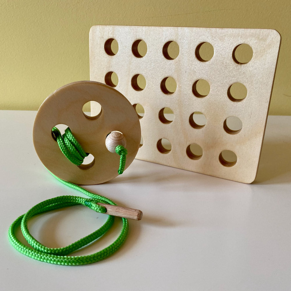 Montessori veramā poga ar rāmi