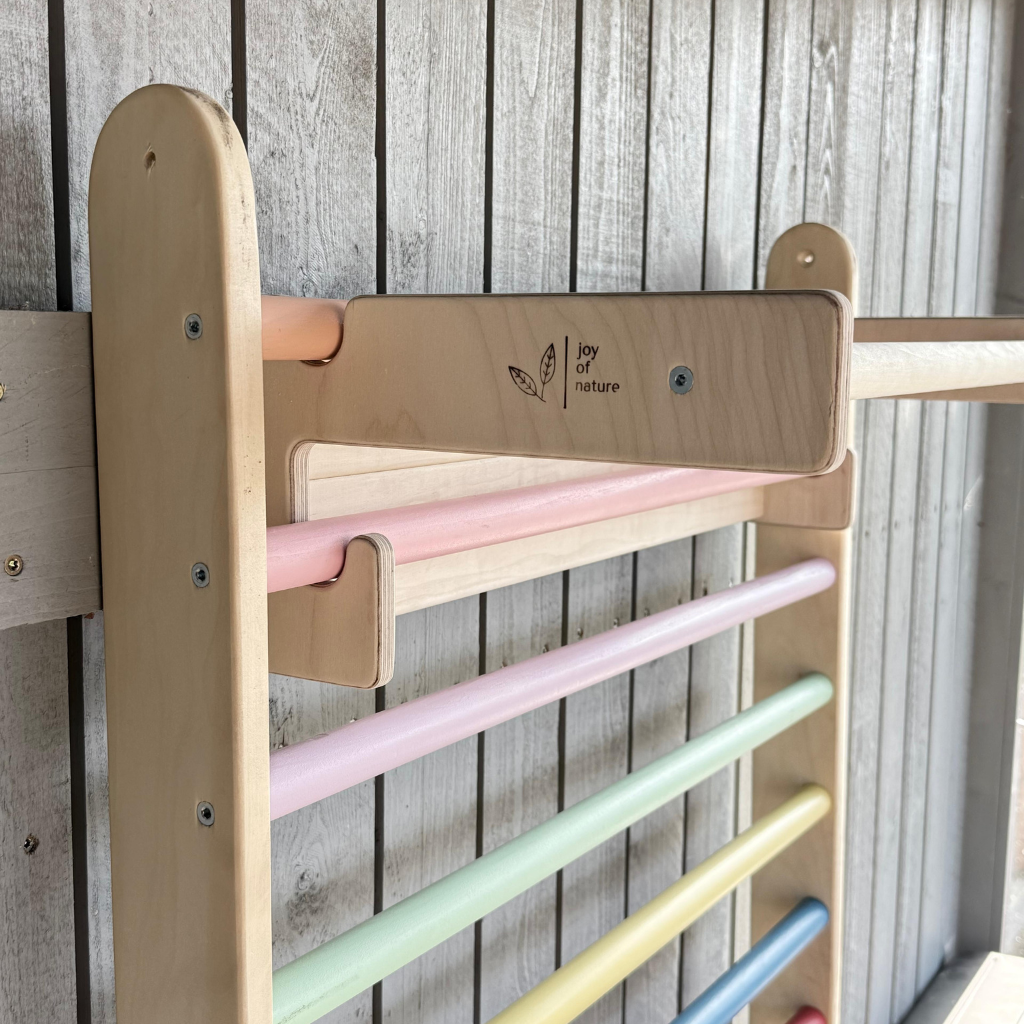 Close-up of wall mount climbing triangle wood joints