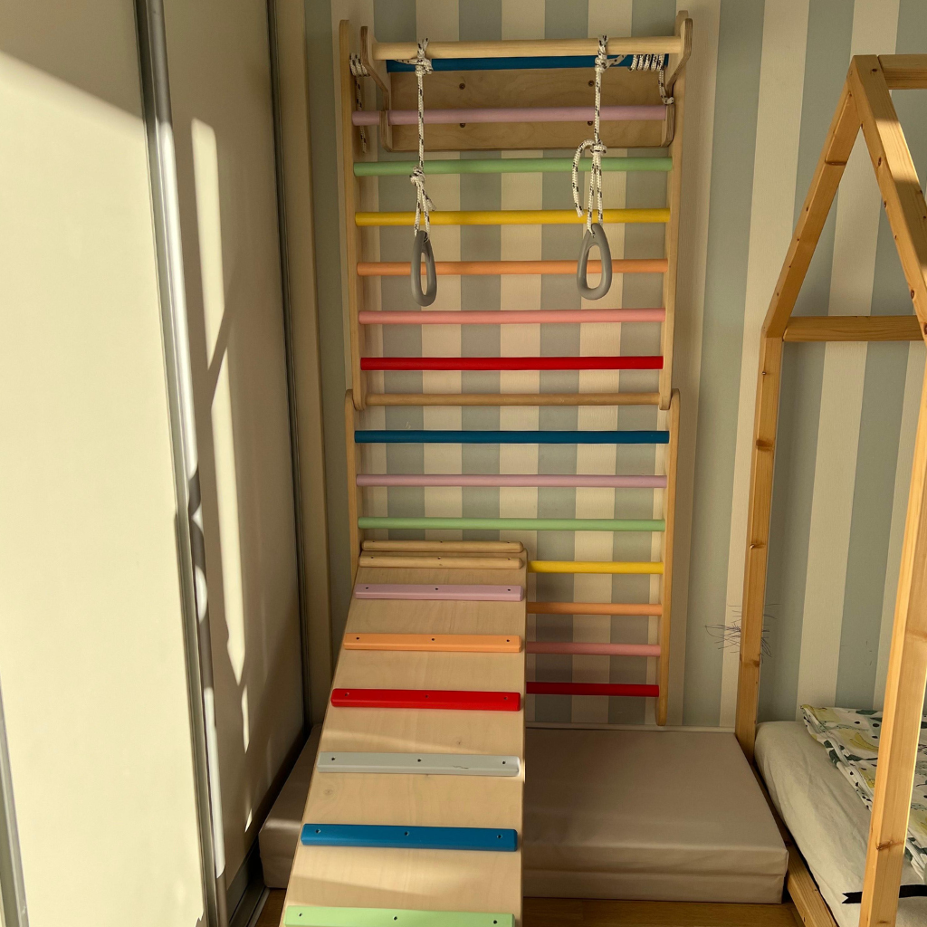 Wall mount climbing triangle installed