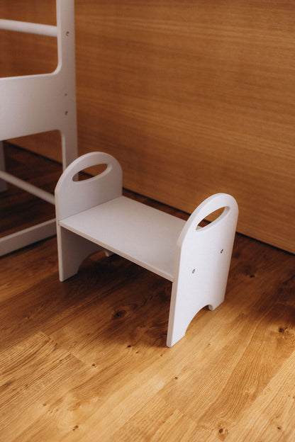 wooden step stool in kitchen